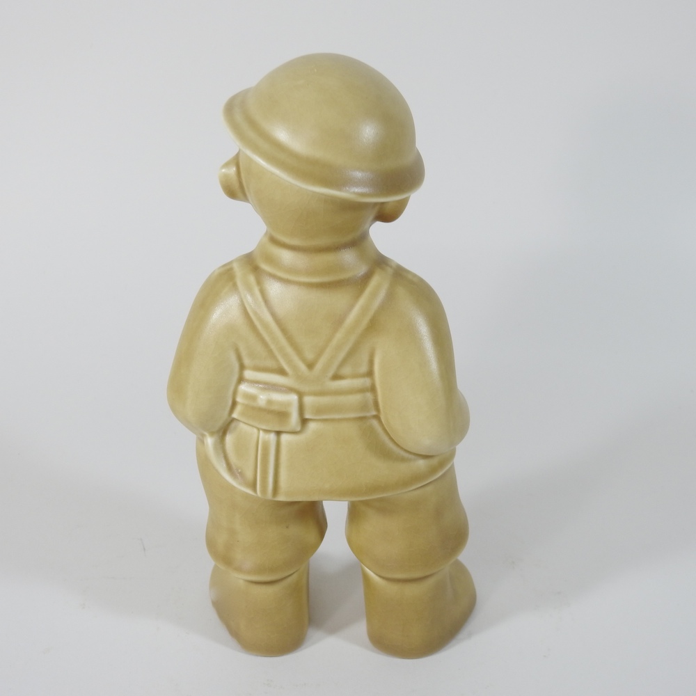 A Bovey Pottery 'Our Gang' figure of a World War II Fireman, - Image 4 of 7