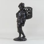 An early 20th century Japanese bronze figure of a lady, shown standing,