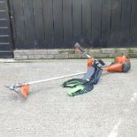 A Husqvarna petrol garden strimmer