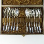 A collection of twelve Victorian silver fiddle pattern teaspoons,