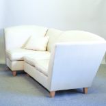 A Wesley Barrell cream upholstered corner sofa,