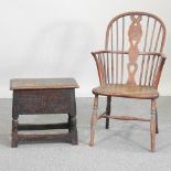 A 19th century elm seated stick back armchair, together with an oak bible box,