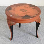 An early 20th century Japanese lacquered circular occasional table,