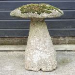 An antique carved granite staddle stone, 60cm.