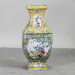 A modern Chinese porcelain vase, decorated with birds and flowers,
