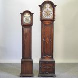 An early 20th century oak cased longcase clock with Westminster chimes, 188cm high,