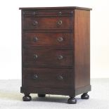 A George III style mahogany chest of small proportions, having a brushing slide,