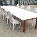 A set of eight cream painted and grey upholstered dining chairs,