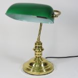 A 1920's style brass desk lamp, with a green glass shade,