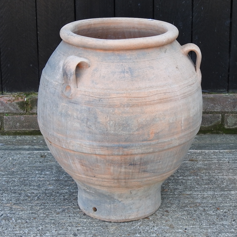 A terracotta olive pot,