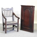 An 18th century oak hanging corner cabinet,