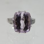 A 9 carat gold pink Brazilian kunzite and diamond ring, with gem set shoulders, size R, 7.