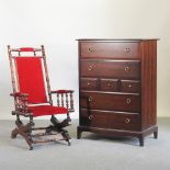 A Stag chest of drawers, 82cm, together with an American rocking chair,