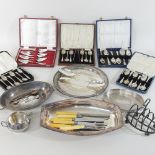 A collection of various silver and silver plated tea and coffee spoons, some cased,
