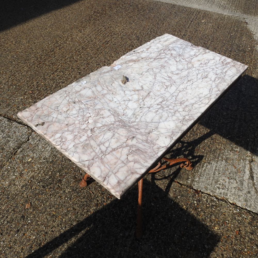 An iron garden table, with a marble top, - Image 4 of 4