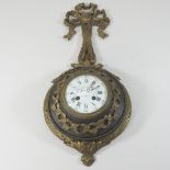 A 20th century French style bronzed cased wall clock, with tied decoration,