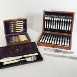 A set of twelve early 20th century Mappin and Webb silver plated fruit knives and forks,