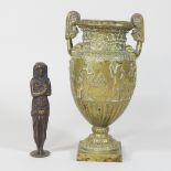 A 19th century Grecian bronze gilt vase, of urn shape, relief decorated with figures, 21cm high,