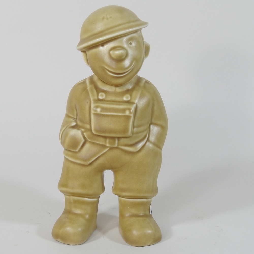 A Bovey Pottery 'Our Gang' figure of a World War II Fireman, - Image 2 of 7