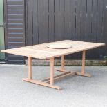A hardwood iroko extending garden table, 192 x 122cm,