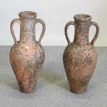 A pair of terracotta urns, of amphora shape,