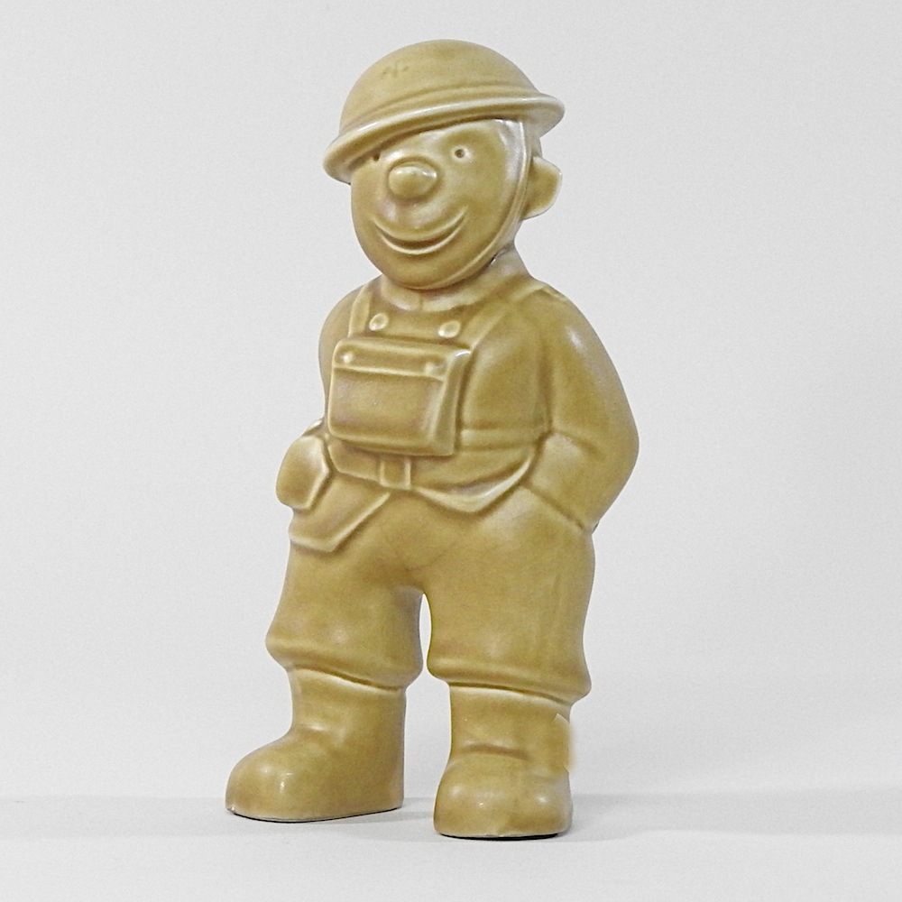A Bovey Pottery 'Our Gang' figure of a World War II Fireman,