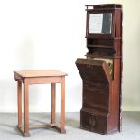 An early 20th century mahogany ship's sink, together with an oak school desk,