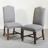 A set of six blue upholstered high back dining chairs