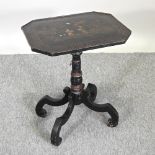 An early 20th century ebonised chinoiserie decorated occasional table, decorated with figures,