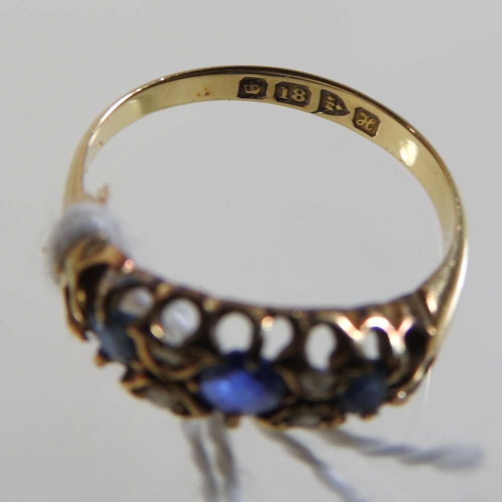 An 18 carat gold seven stone sapphire and diamond half hoop ring, sizes M, - Image 2 of 2