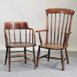 An early 20th century elm seated captain's chair,