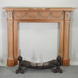A Victorian pine fire surround, 165cm, together with a cast iron fire grate,