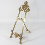 A brass table easel,