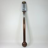 A 20th century rosewood cased stick barometer, having an exposed tube,