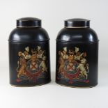 A pair of modern black painted metal tea canisters,