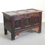 An 18th century oak coffer,