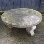 A large reconstituted stone garden circular table, 117cm diameter,