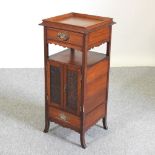 An Edwardian light oak smoker's cabinet,