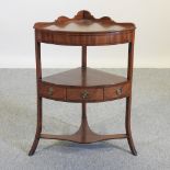 A George III mahogany corner washstand,