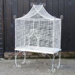 A vintage white painted metal bird cage,