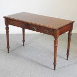 A Victorian mahogany side table, containing two drawers,