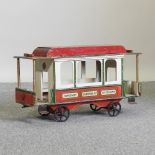 A vintage painted wooden model tram,