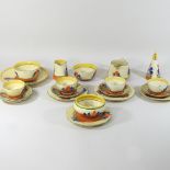 A Clarice Cliff Crocus pattern part tea service, to include a sugar conical sugar sifter, 14cm high,