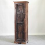 An Eastern hardwood narrow cabinet,