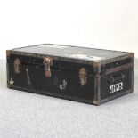 An early 20th century black travel trunk,