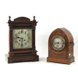 A walnut cased mantel clock, 38cm high,