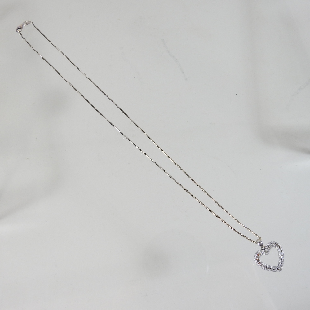 A 14 carat gold and diamond heart shaped pendant, 2cm wide, on a fine chain, 6. - Image 4 of 7