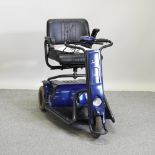A Superlight blue electric rear wheel drive mobility scooter,
