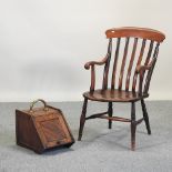 An early 20th century elm seated splat back armchair, together with an Edwardian oak coal purdonium,