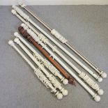 A collection of white painted wooden curtain poles, together with another (8),
